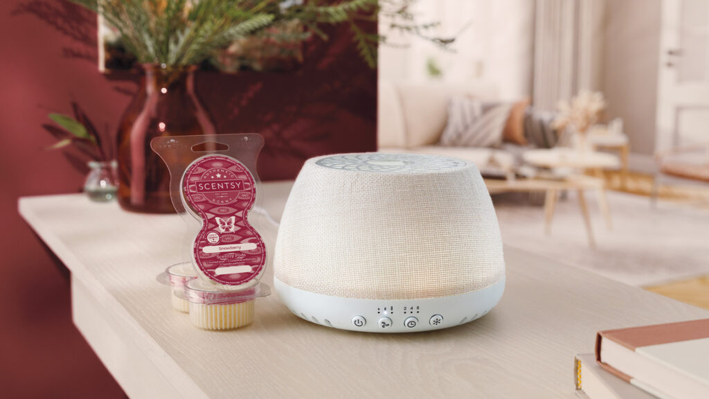 Scentsy Air Linen and Scentsy pods on a living room countertop.