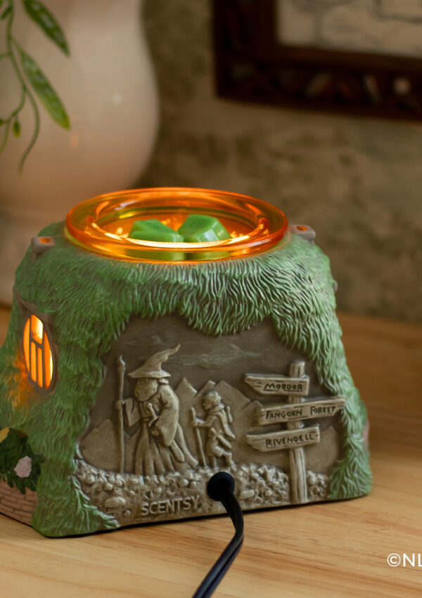 The Scentsy Lord of the Rings Warmer on a tidy desk.