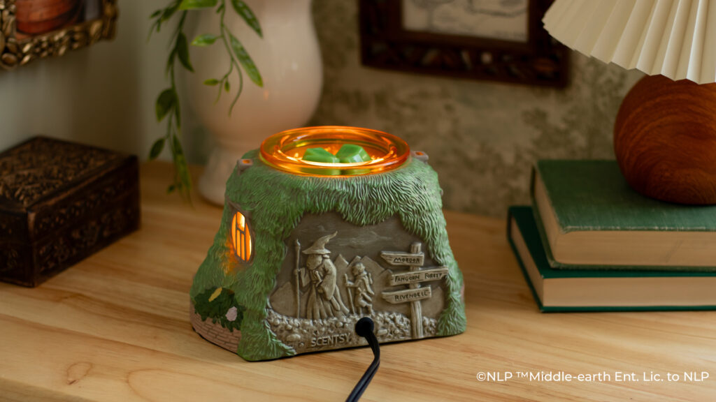 The Scentsy Lord of the Rings Warmer on a tidy desk.