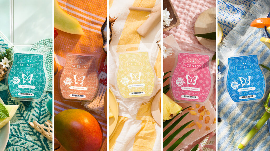 Wild Seaside, Sunset Cocktail, Sun-drenched Cotton, Santorini Blossom, and Sorrento Breeze Scentsy bars from the Scentsy Destinations Collection are each individually surrounded with blossoms, fruits, herbs, and other items that match each wax bar's fragrance notes.