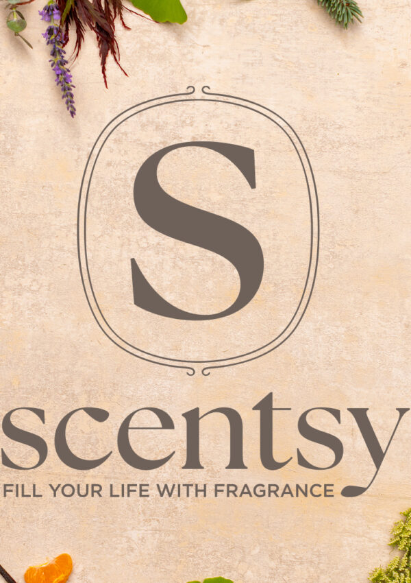 The new Scentsy Logo is depicted in a grassy yellow-green surrounded by a foliage border. The logo is an elegant S framed by a thin oval with the word Scentsy below.