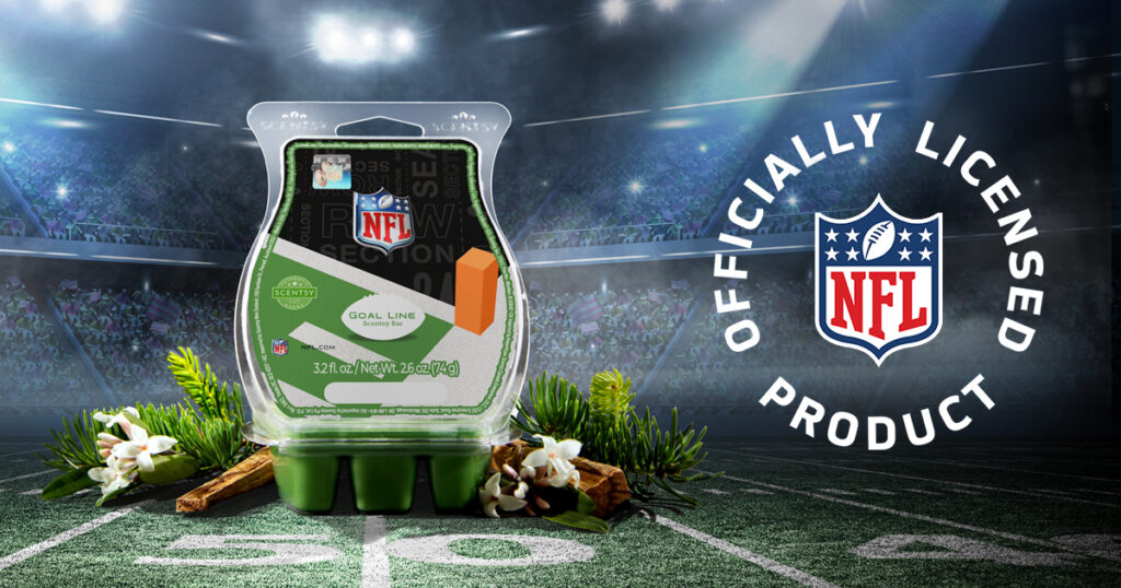 Scentsy's NFL Goal Line Wax Bar sits super-imposed on the fifty yard line of an NFL turf, surrounded by pine, cinnamon, and blossoms with a stadium in the background and the offical NFL logo beside it.
