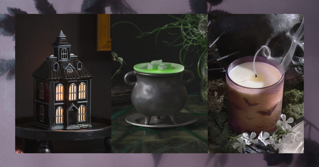 Halloween themed warmers in Scentsy's September Edit are displayed in a dark and opulent setting with red velvet, stacked books and more.